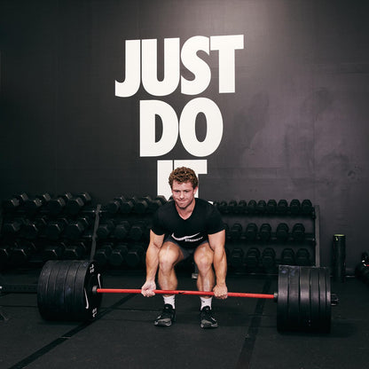 Nike Strength Coated Premium Barbell - 20 kg / Red Swoosh